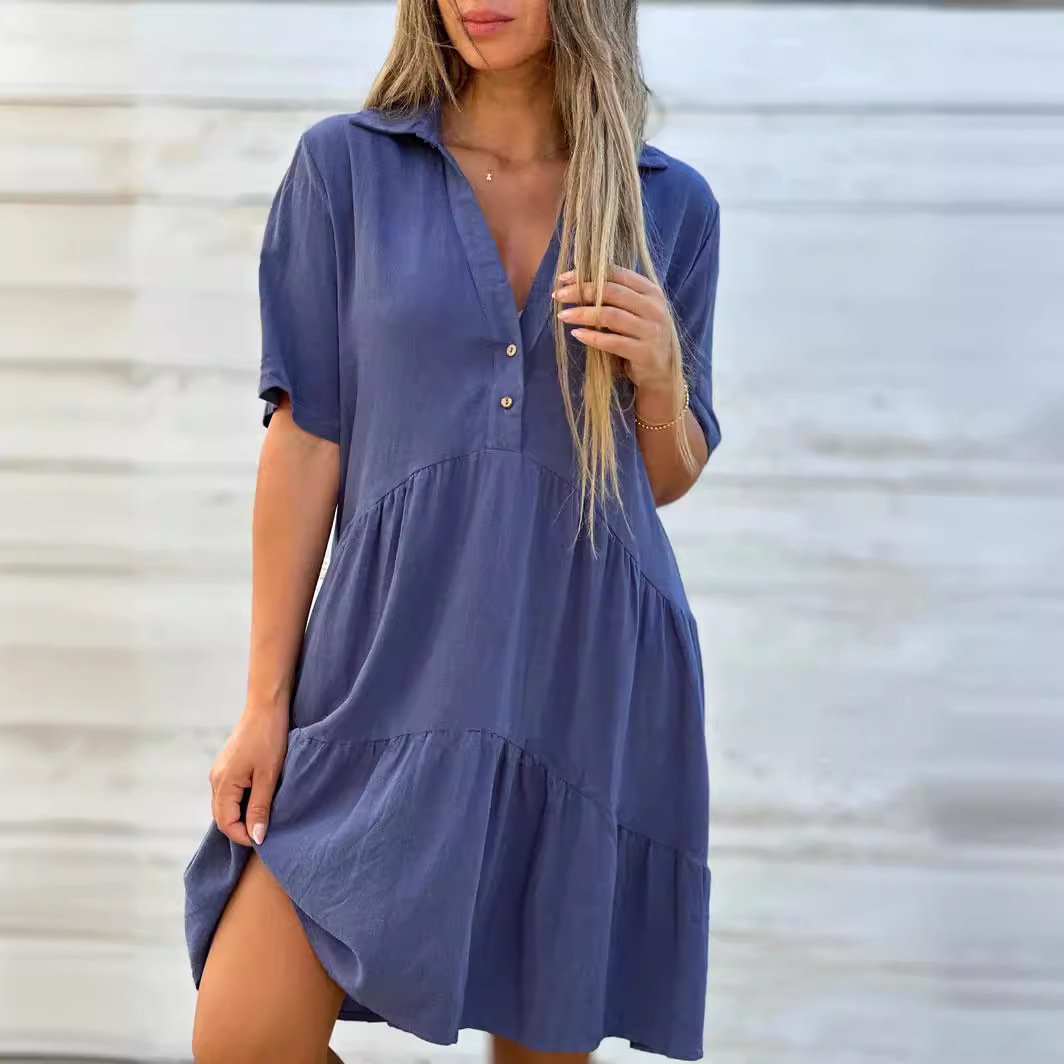 Einfarbiges, legs kleid mit revers und knöpfen