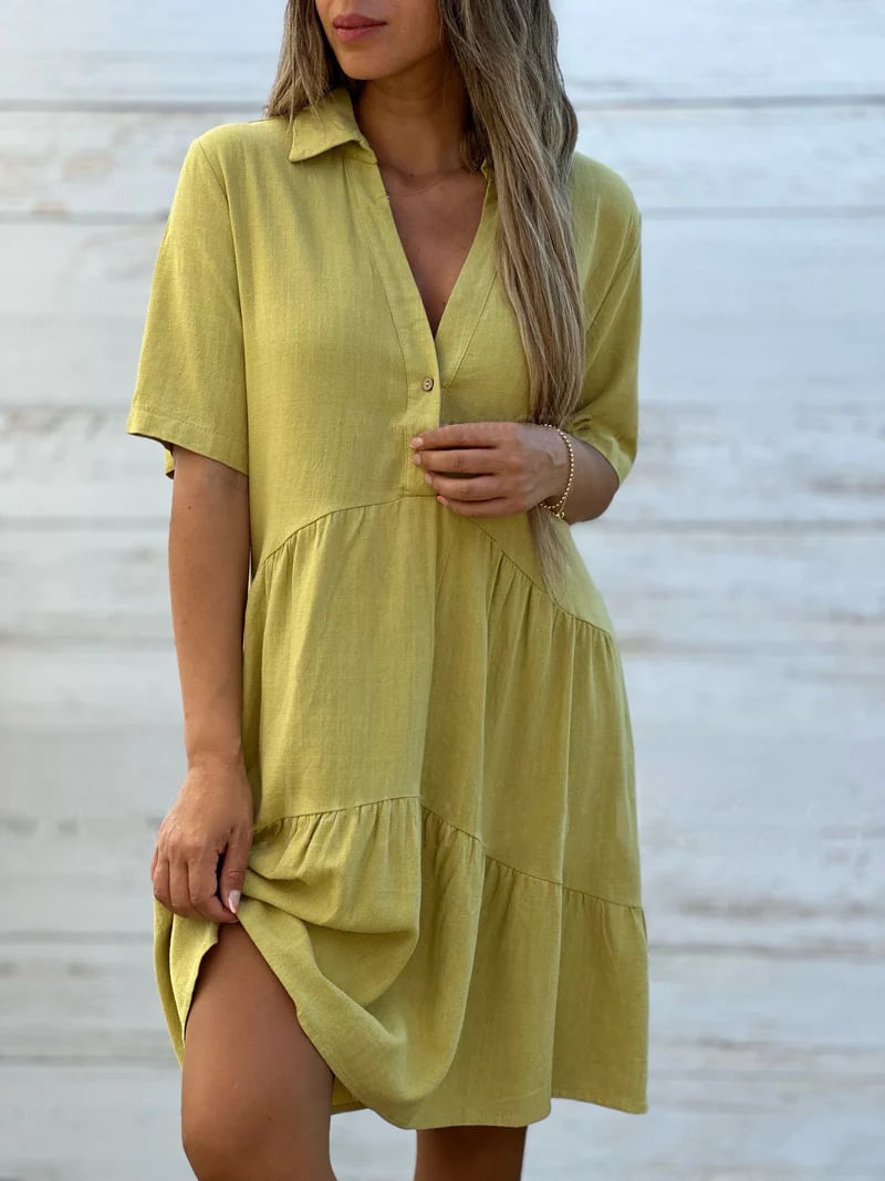 Einfarbiges, legs kleid mit revers und knöpfen