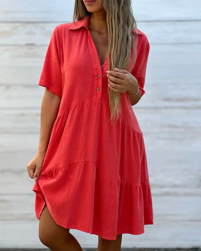 Einfarbiges, legs kleid mit revers und knöpfen